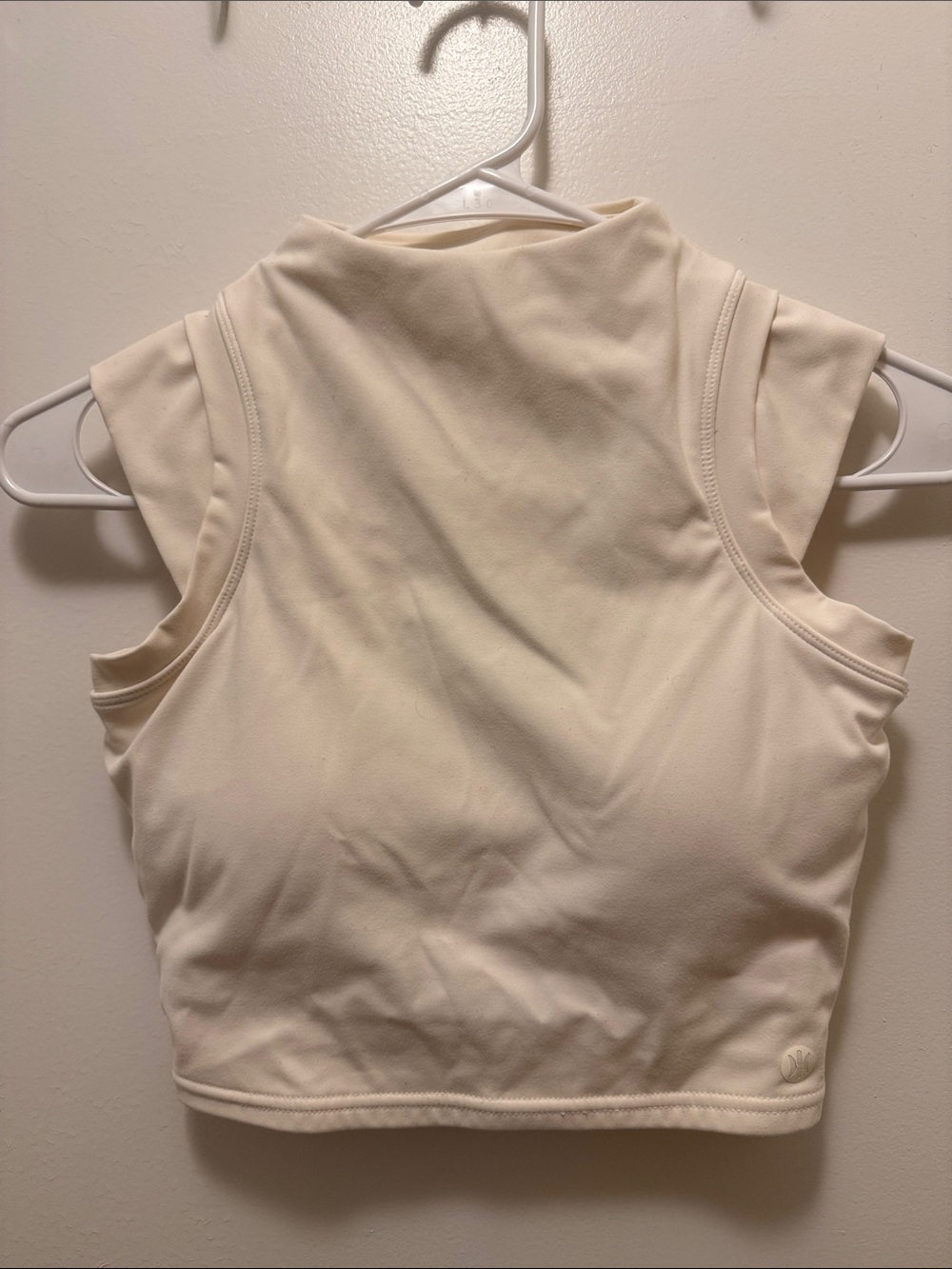 Astoria Activewear Sleeveless High-Neck Crop Tank in Cream/White